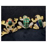 Three Ornate Gold-Tone Frog Pins with Gemstone Acc