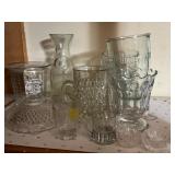 Clear Glassware Including Mugs, Pitcher, and Decor