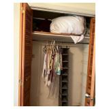 Wooden Closet with Louvered Doors and Clothing Acc