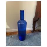 Large Blue Glass Bottle with Tall Neck Design