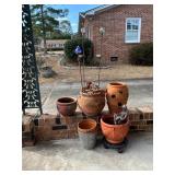 Terracotta Pots, Metal Planter, and Decorative Sta