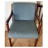 Wood-Framed Armchair With Blue Upholstered Cushion