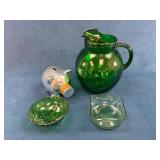 Green Glass Pitcher, Dishes, and Metal Piggy Bank