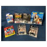 Eight Hot Wheels Die-Cast Cars Including Themed Mo