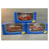 Three Die-Cast Fire Trucks in Original Packaging