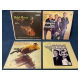 Four Vintage Vinyl Records Featuring Varied Artist