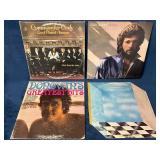 Four Vinyl Records Featuring Various Artists