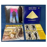 Four Vinyl Records Featuring Various Artists