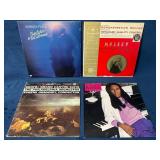 Four Vinyl Records Featuring Various Artists and G
