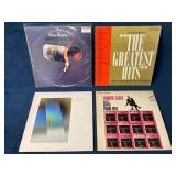 Four Vinyl Records Including Latin and Pop Music