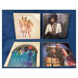 Four Vintage Vinyl Records Including Stanley Clark