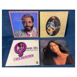 Four Assorted Vinyl Records Featuring Various Arti