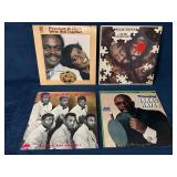 4 Vinyl Records Including Isaac Hayes and Peaches