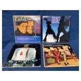 Four Vinyl Records Featuring Jazz and Vocal Artist