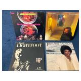 Four Classic Vinyl Records by Popular Artists