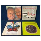 Four Vinyl Records Featuring Various Artists
