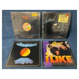 Four Vinyl Records Including Disco and R&B Artists