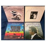 Four Vinyl Records by Charlie Rich, Johnny Mathis,