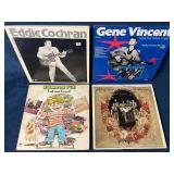 Four Vinyl Records by Eddie Cochran, Gene Vincent,