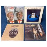 4 Vinyl Records Featuring Carl Perkins, Lester Fla