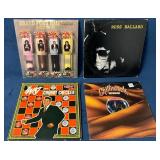 Four Vinyl Records Featuring Various Artists