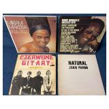 Four Vinyl Records Featuring International Music A