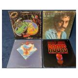 4 Vinyl Records Featuring Classic Artists