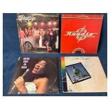 Four Vinyl Records Featuring Various Artists