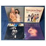 Four Vinyl Records Featuring Various Artists