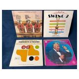 Four Vinyl Records Featuring Swing and Classic Hit