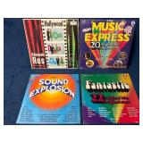 Four Vinyl Records Featuring Various Artists and C