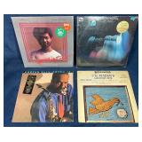 Four Vinyl Records Featuring Grover Washington Jr.