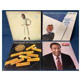 Four Vinyl Records: Kenny Rogers, Bill Cosby, and