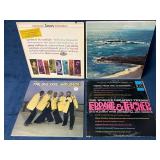 Four Vinyl Records Featuring Various Artists and G