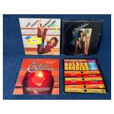 Four Vinyl Records Featuring Various Artists and G