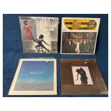 Four Vinyl Records Featuring Various Artists and G