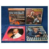 Four Vintage Vinyl Records Featuring Various Artis