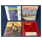 Four Vinyl Records Featuring Various Artists and G