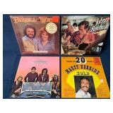 4 Vinyl Records Featuring Country Music Artists