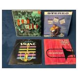 4 Vinyl Records Featuring Jazz and Swing Music
