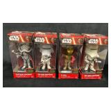 Four Funko Star Wars Vinyl Bobble-Head Figures in