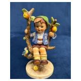 Goebel Hummel Figurine of Boy Sitting on Tree Bran