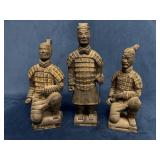 Three Replica Figurines Depicting Terra Cotta Chin