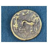 Ancient Coin Featuring Animal Motif and Inscriptio