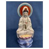 Ceramic Figurine of Guanyin Sitting Atop a Lotus o