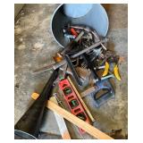 Teal Trash Can with Miscellaneous Tools