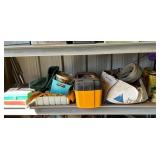 Items on One Shelf Including Toolbox, Books, and H