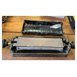 Three-Sided Honing Stone with Various Grits and Bl