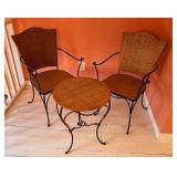 Two Woven Rattan Chairs and Matching Round Table