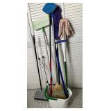 Cleaning Supplies Group Including Mop, Broom, and